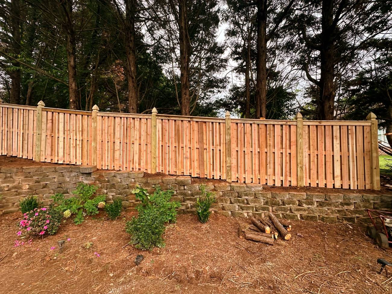 Shadow box fence with cap, trim, and 6x6 spear top posts