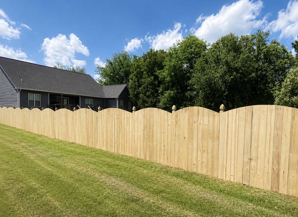 Scalloped wood privacy fence